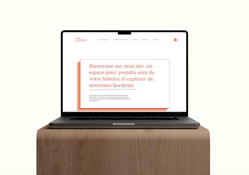 Anne Schupbach website mockup on laptop