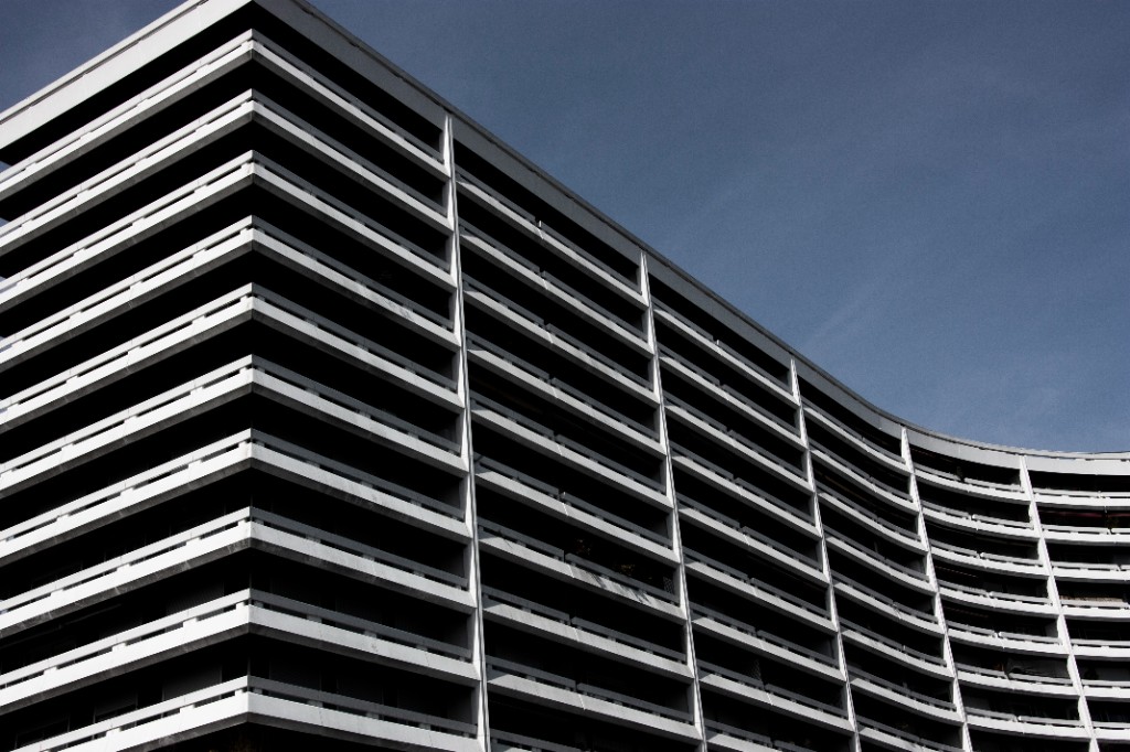 Photography by Hugo Landais, modern high-rise balconies from a low angle.